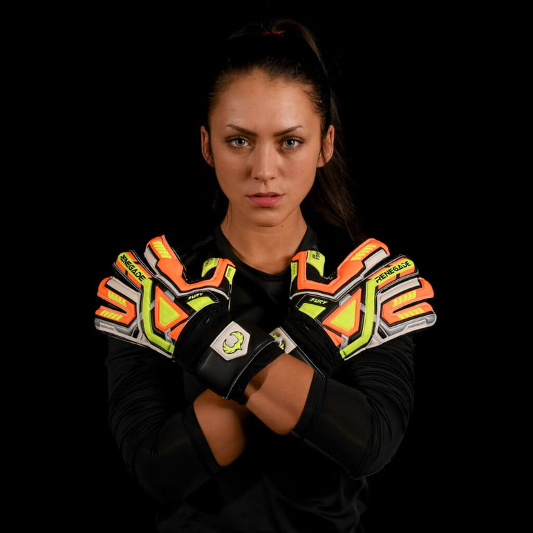 female goalkeeper wearing fury volt goalie gloves