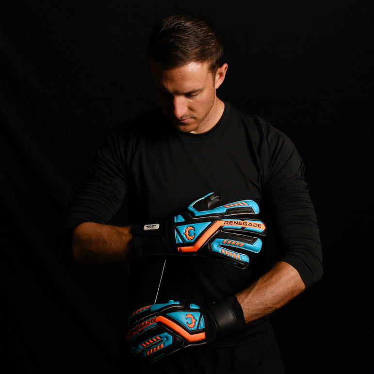male goalkeeper wearing talon cyclone 2 keeper gloves
