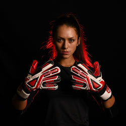 female goalkeeper wearing fury inferno goalie gloves