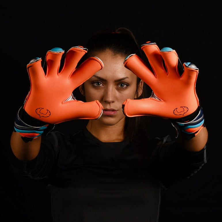 female goalkeeper wearing fury siege goalie gloves
