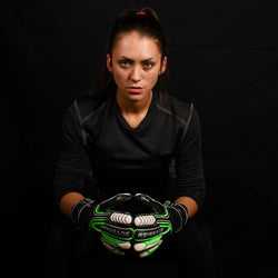 female goalkeeper wearing vulcan abyss keeper gloves