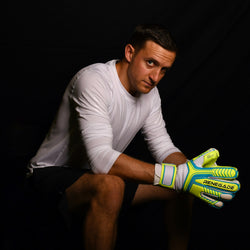 male goalkeeper wearing vulcan surge gk gloves